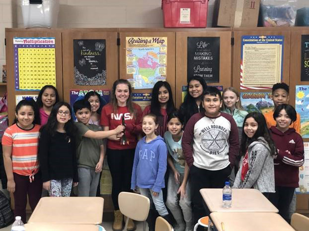 Erika Varady with a class of Woodhull School fifth graders.