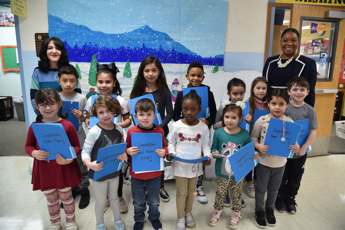Art teacher Maria Mazzola and Principal Michelle Richards with the Featured Artists of the Month (1)