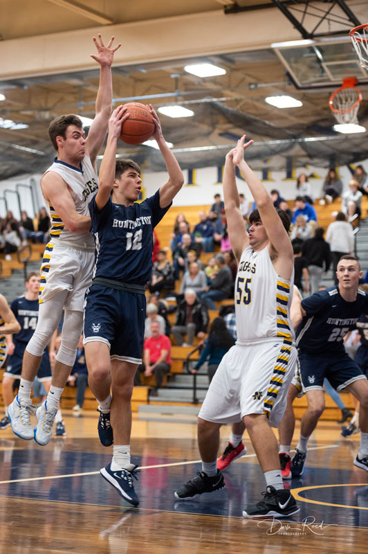 Huntinton's Max Rentsch (No. 12) gets double-teamed. (Darin Reed photo.)