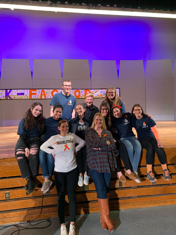 Molly Kessler (right) with fellow Key Club officials and faculty advisors at the K-Factor talent show.