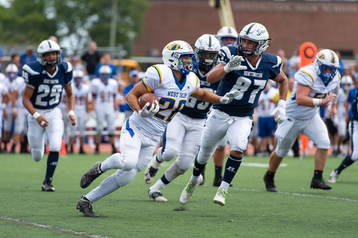 Jon Koumas (No. 87) in pursuit against West Islip this season. (Darin Reed photo)