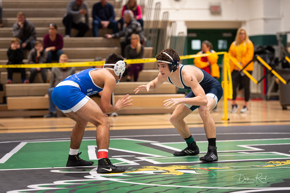 Huntington junior Ethan Franciscovich (right) in action for the Blue Devils. (Darin Reed photo.)