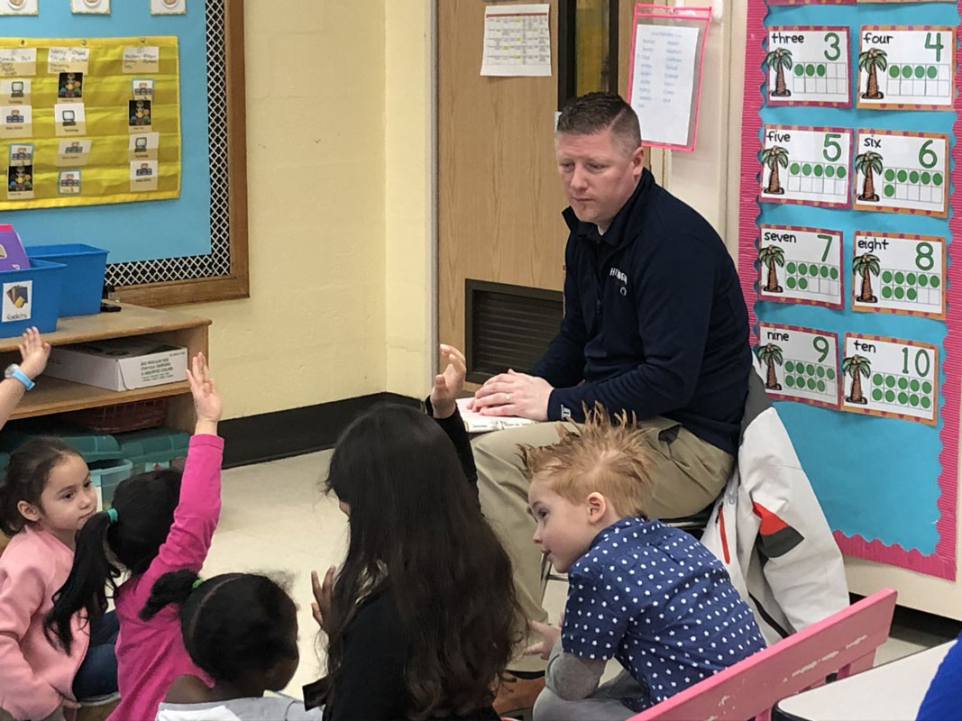Huntington High School Principal Brenden Cusack visited Southdown School as a guest reader.