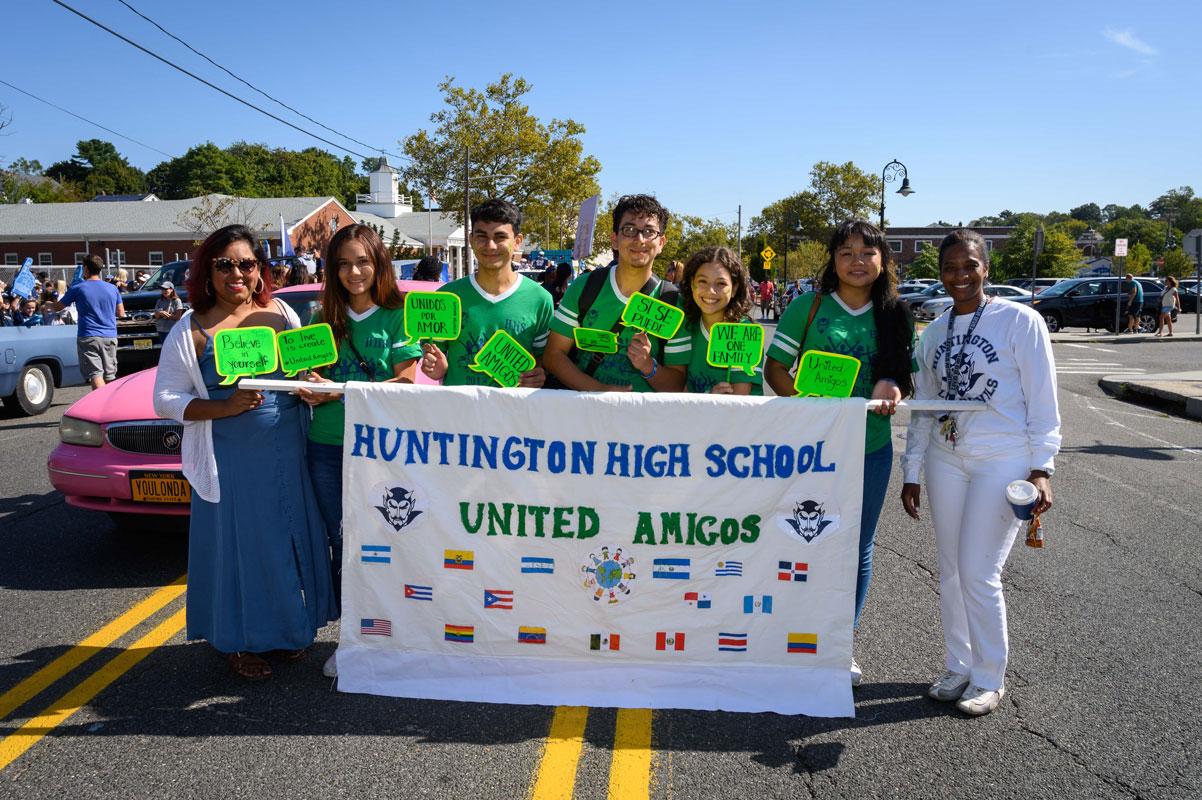 United Amigos club members in last fall's Homecoming Day parade in the village. (Darin Reed photo.)