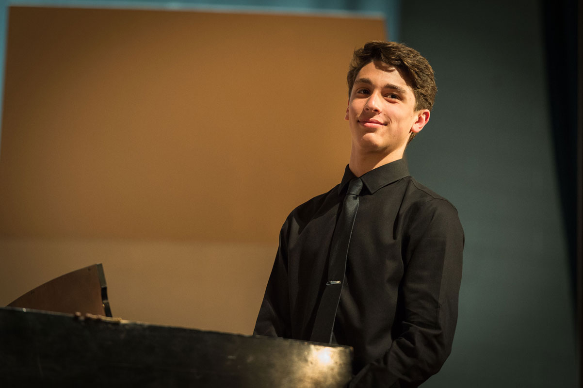 Julien Rentsch on the Huntington High School stage. (Darin Reed photo)