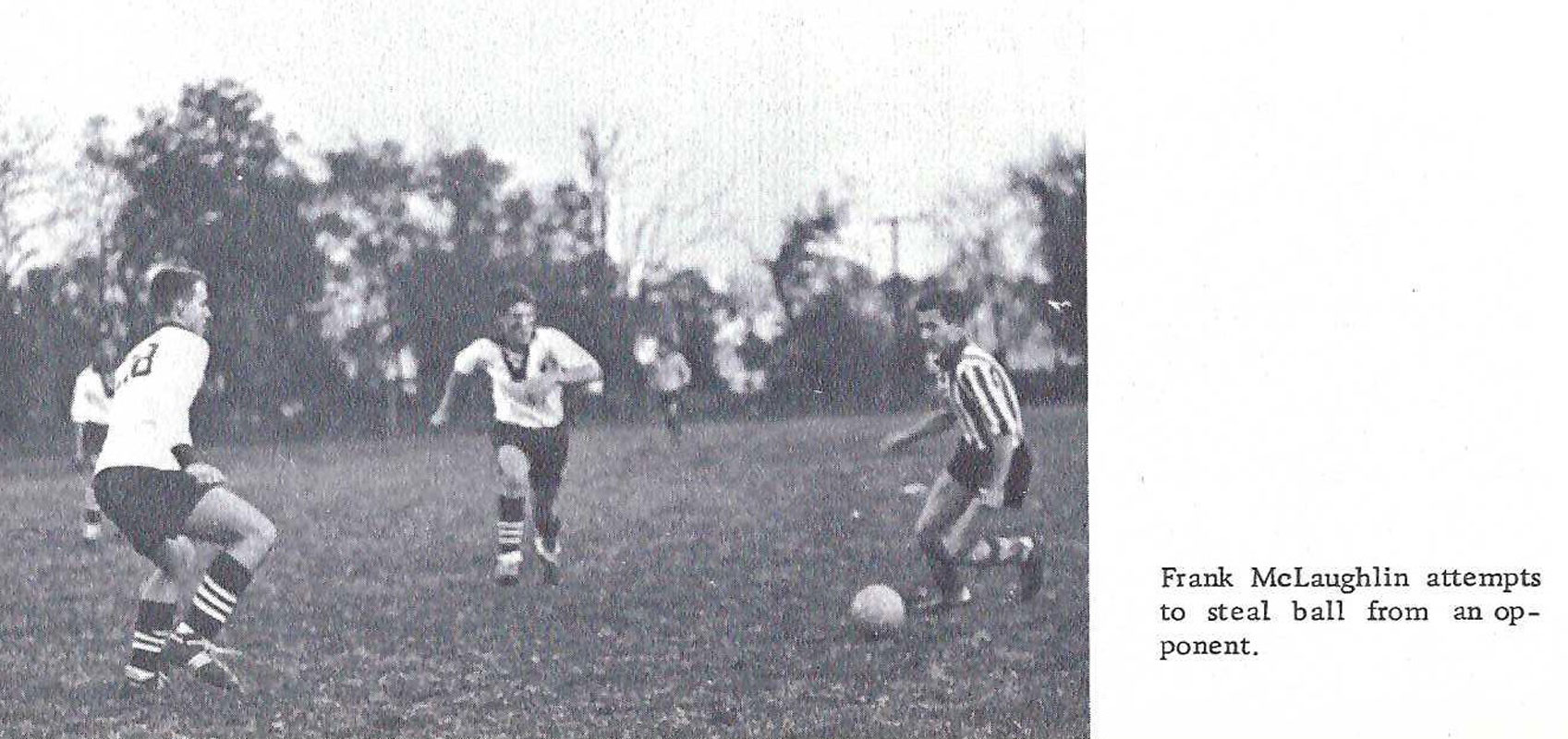 The Huntington defense closes in on the ball in 1961.