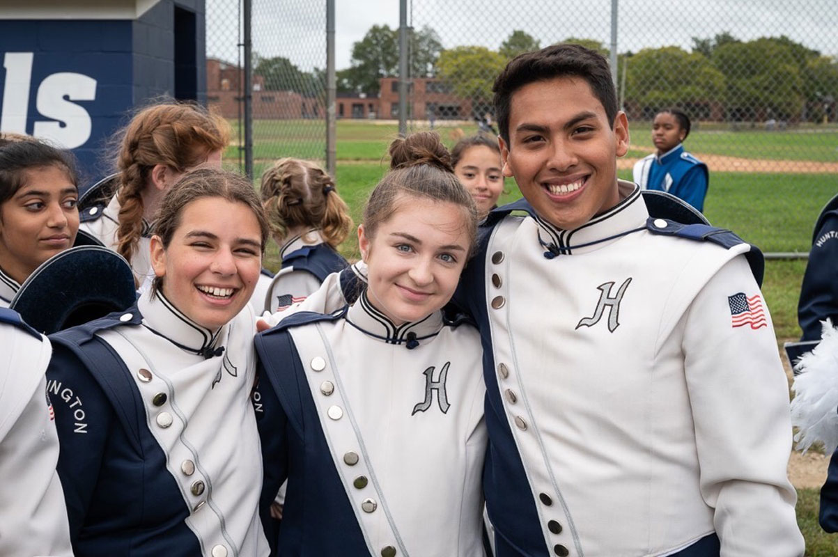 Natalie Ciccone (center) with fellow Blue Devil marching band members last fall. (Darin Reed photo.)