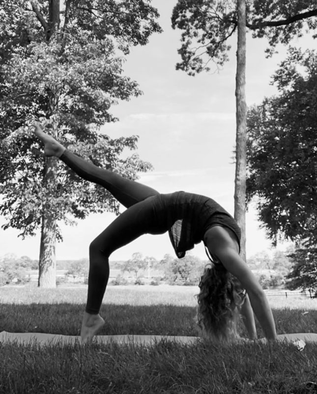 Huntington grad Emma Farrell is a yoga enthusiast