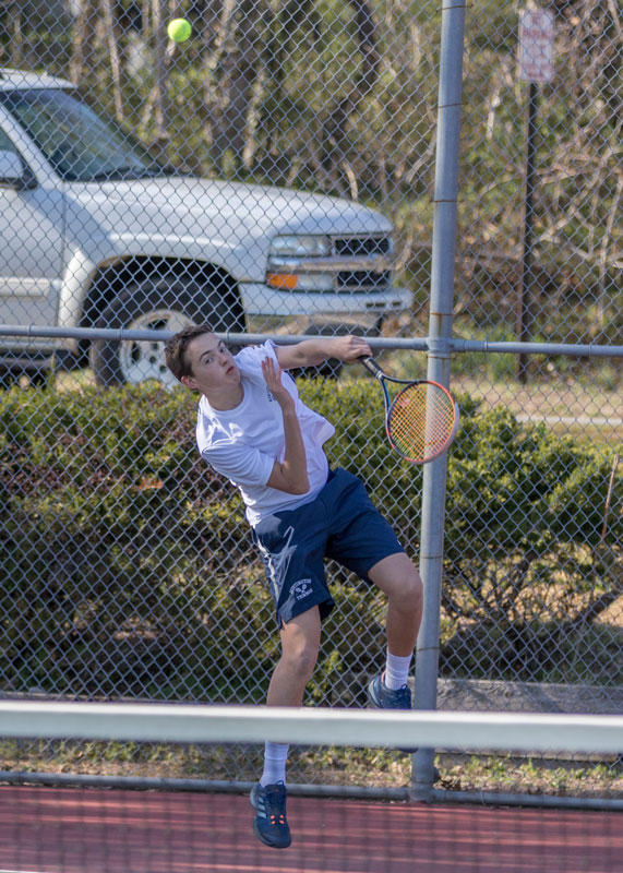 Jason Verville in action for the Blue Devil tennis team. (Mike Connell photo)