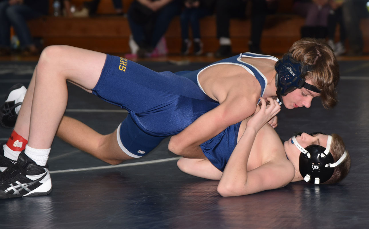 Jack Ruthkowski (top) was one of Finley's top matmen.