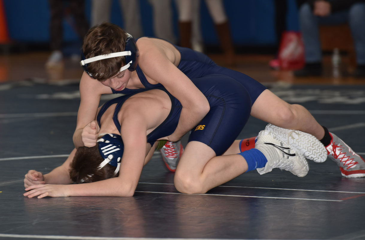 Sam Cirlincione (top) applies pressure to his opponent.