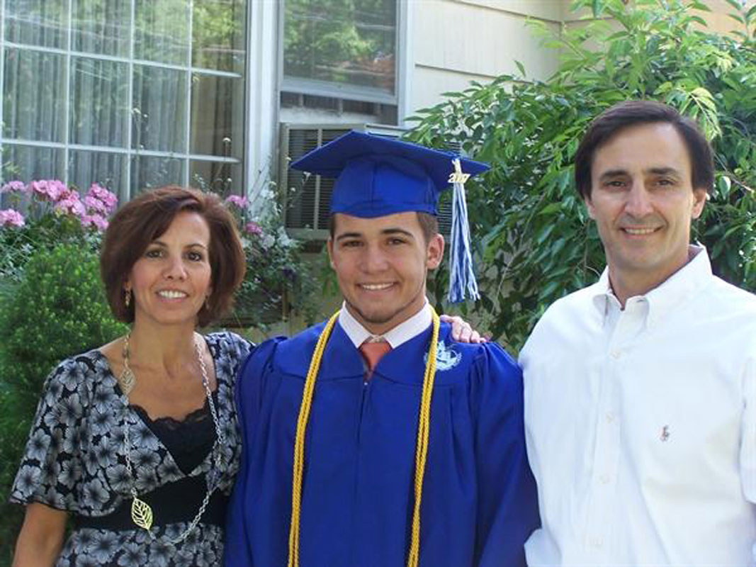 Justin Giani on with his parents, Linda and Joe on the day of his Huntington graduation.