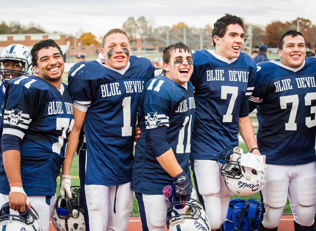 Nick Arleo (No. 11) with his teammates after a victory in 2013.(Darin Reed photo.)
