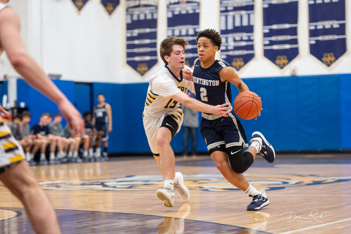 Adrian Brooks has the ball for Huntington. (Darin Reed photo)