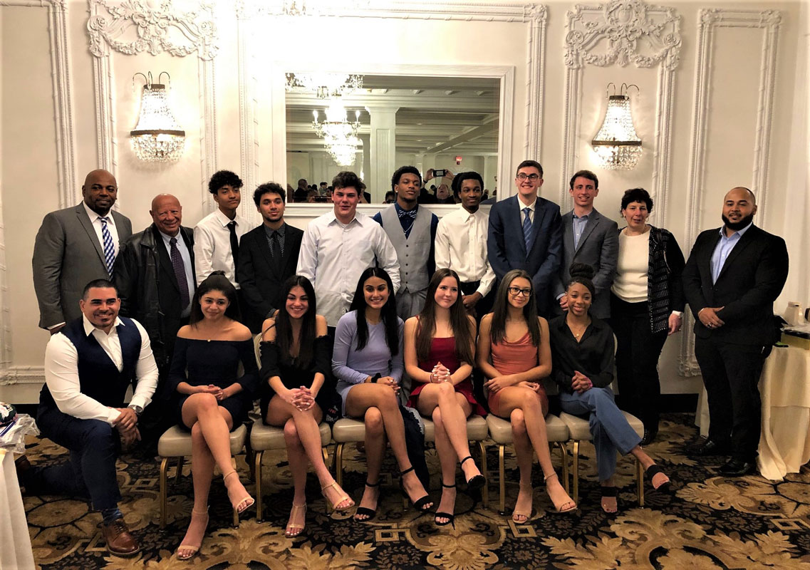 Huntington High School indoor boys' and girls' coaches and athletes at the county awards dinner.