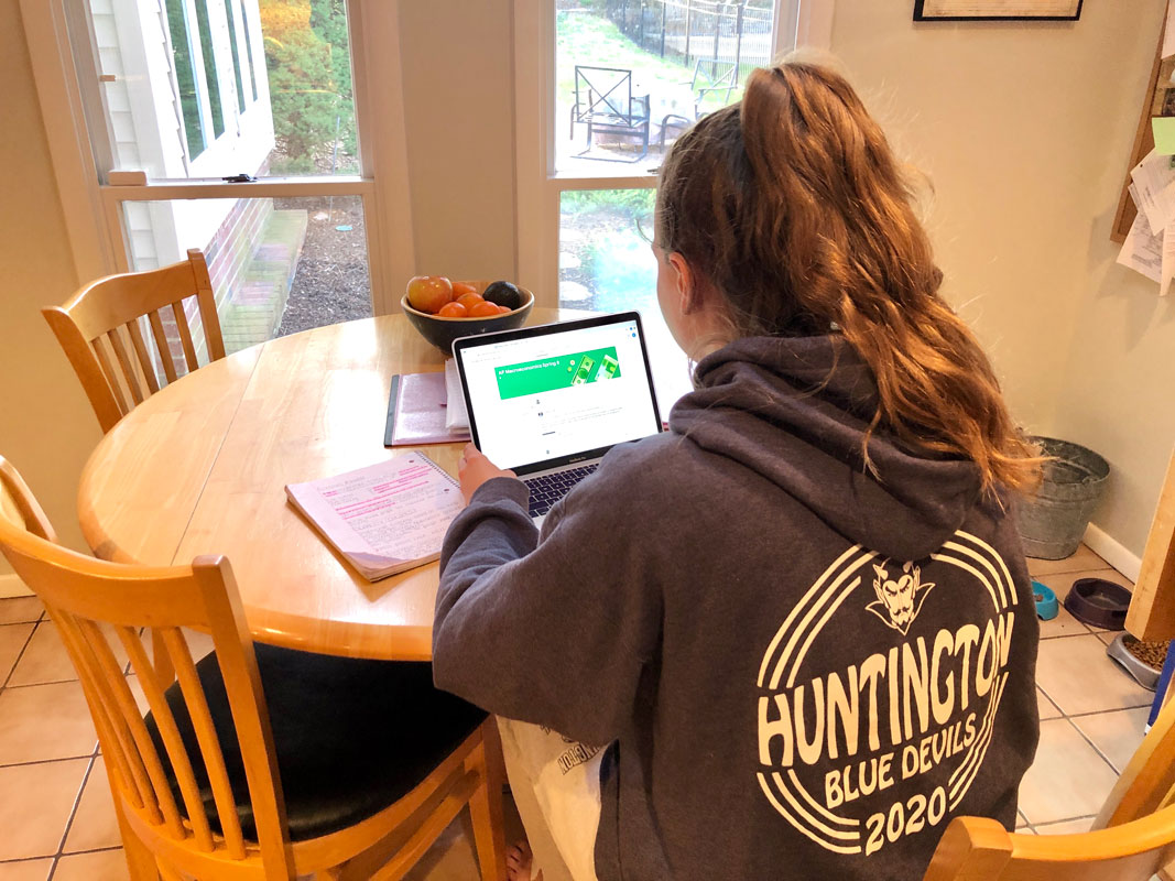 Abby and Christopher Maichin are both putting in a full day studying and working on their assignments.