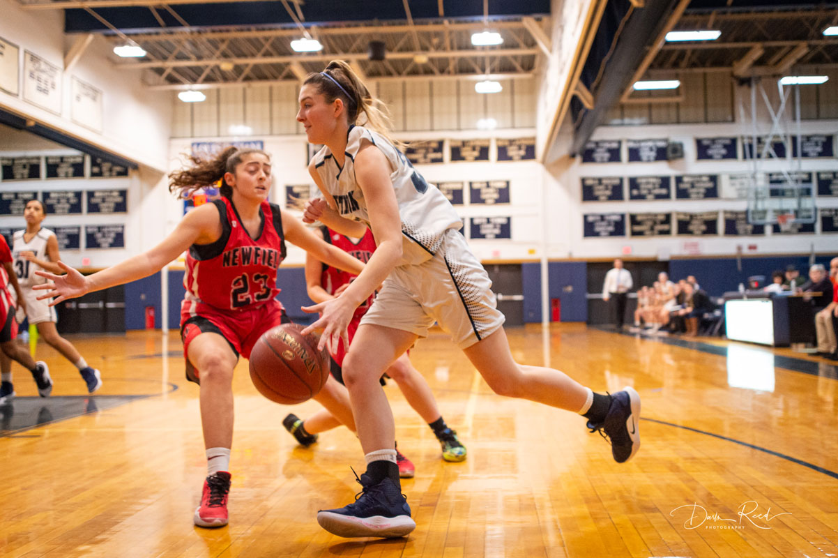 Abby Maichin drives to the basket. (Darin Reed photo.)