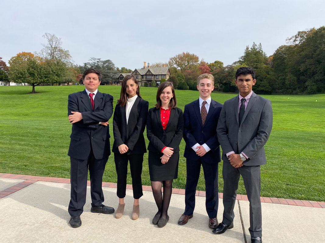 Titan CEO Abigail Holmes (center) and her fellow company executives.