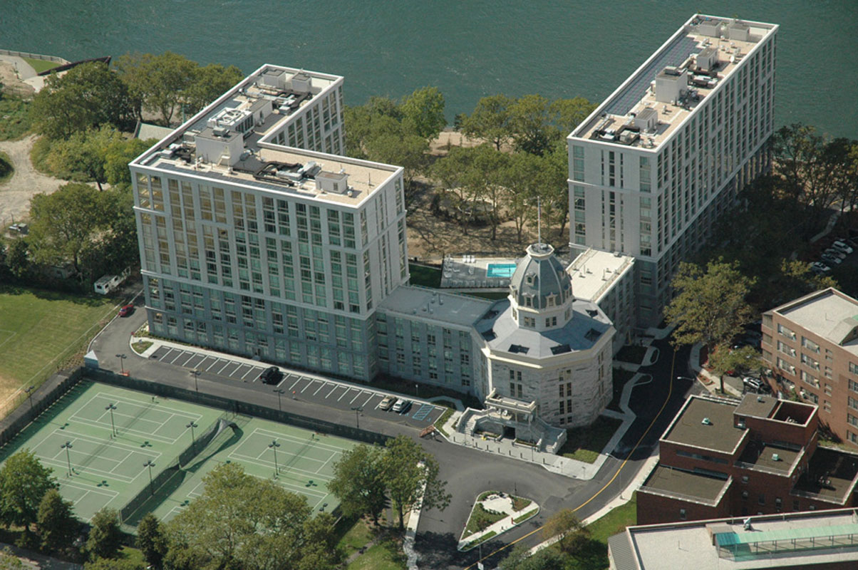 The octagon section of the old hospital still stands as the centerpiece of a luxury housing complex on Roosevelt Island.