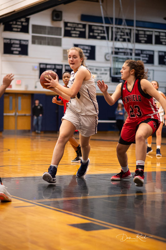 Charlotte Maggio dribbles around the defense. (Darin Reed photo.)