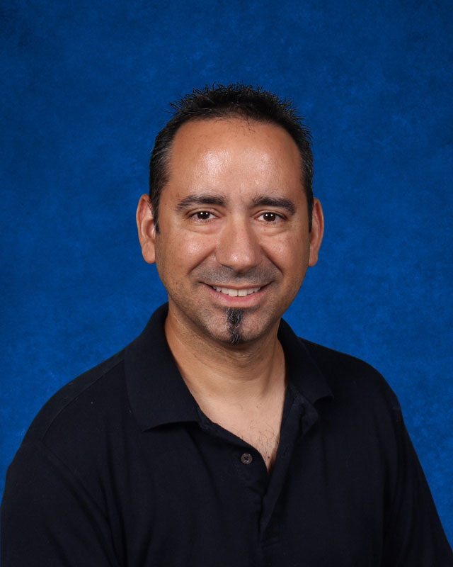 Huntington High School music teacher Jason Giachetti.
