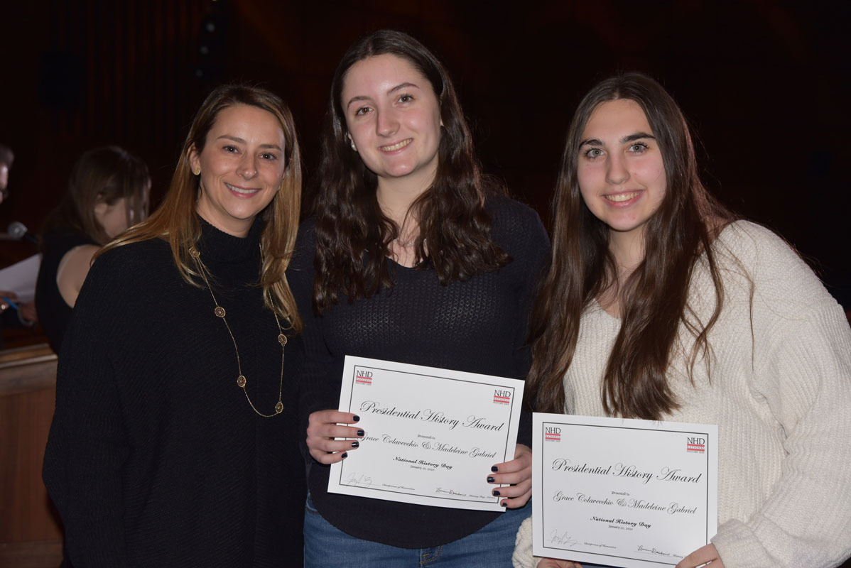 Presidential History Award recipients Grace Colavecchio and Madeleine Gabriel with teacher Lauren Desiderio.