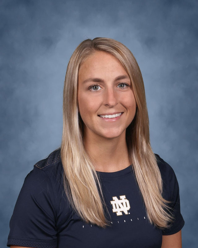 Beth Vogelsang is the head coach of Huntington's varsity girls' lacrosse team.