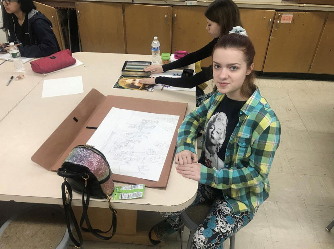 Vivienne LaVertu at work in a Huntington High School art room. 