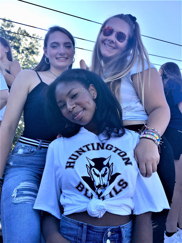 Madison Lange (top right) with her friends at Blue Devil Stadium.