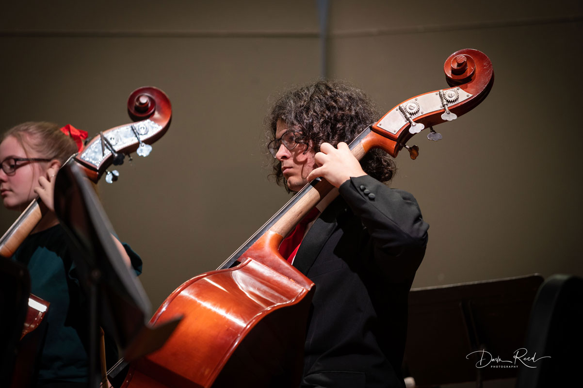 Senior Kyle Perea performs with Huntington High School's orchestra. (Darin Reed photo.)
