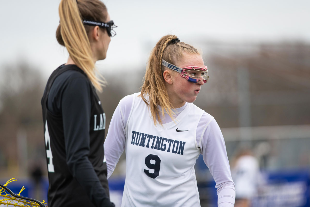 Gretel Cassell (No. 9) is an integral member of the Huntington lacrosse team. (Darin Reed photo.)