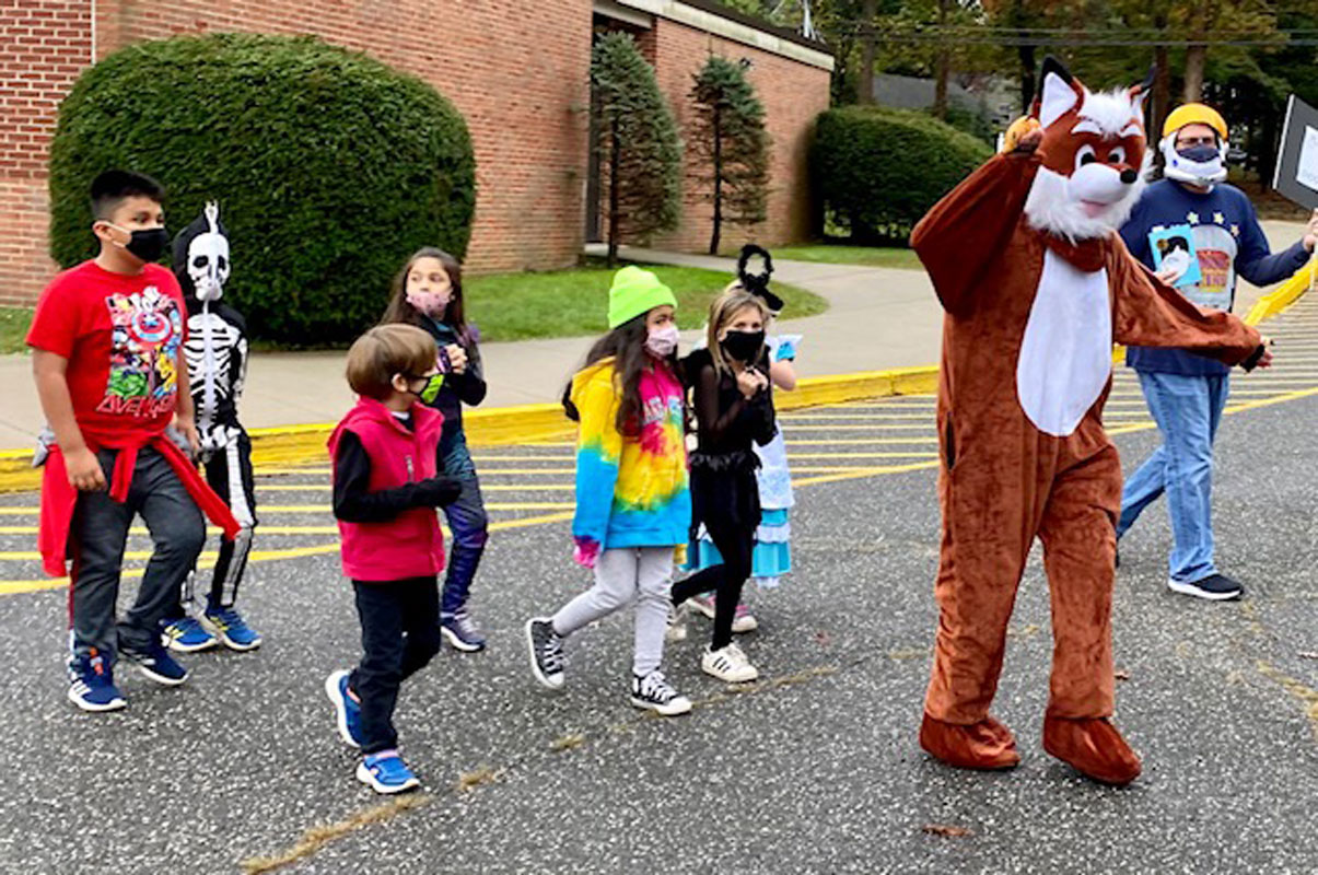 A fury creature recently interacted with Flower Hill students 