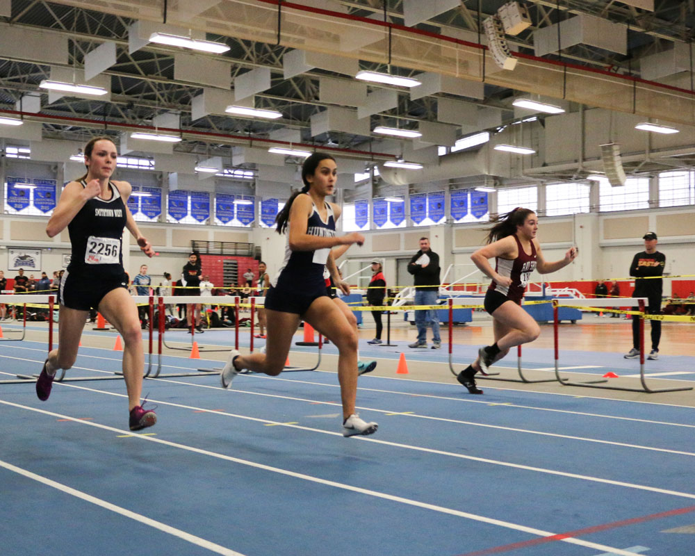 Olivia Conte (second from left) in action for the Blue Devils 