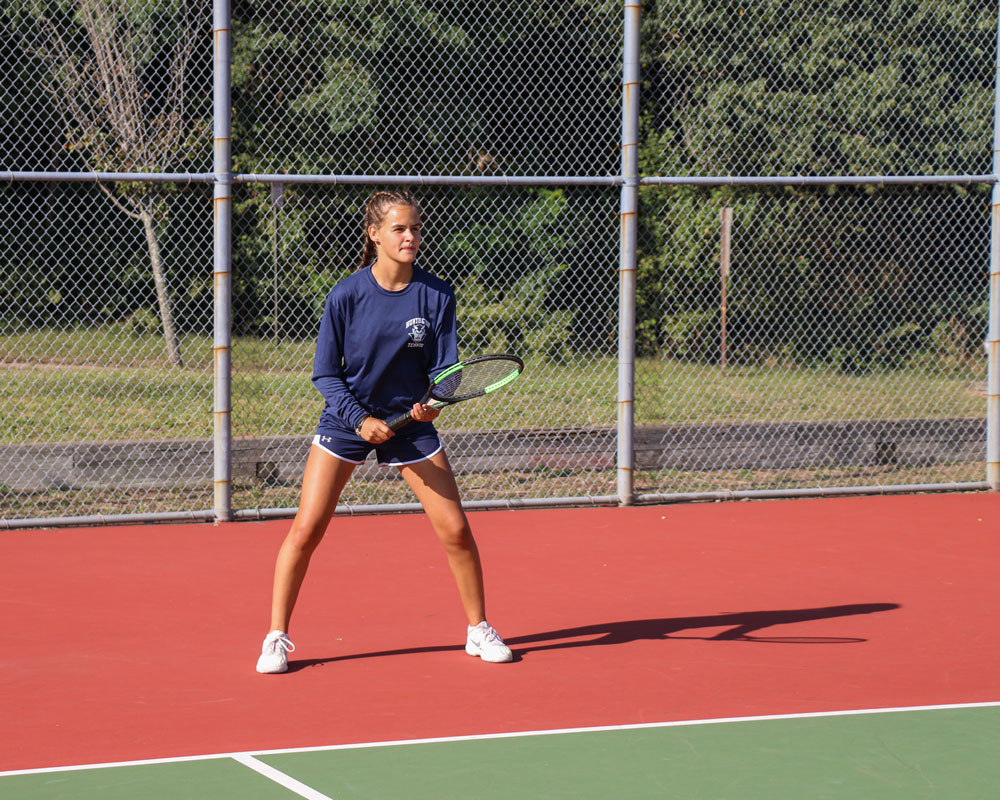 Nina Drakulich is ready to take the serve.