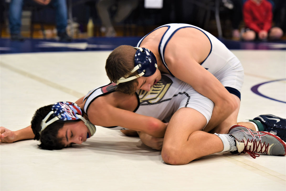 Huntington senior Joe Petrone is in control of the match.  