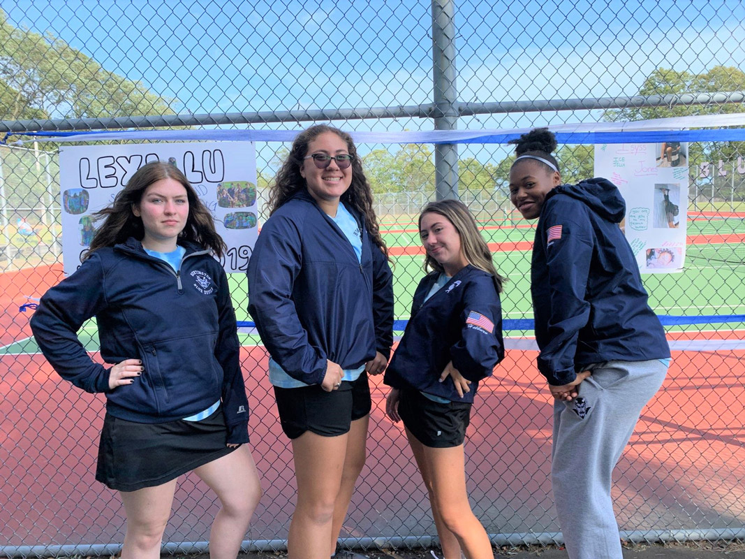 Caitlyn Palermo (second from left) with fellow Blue Devil tennis seniors last fall.