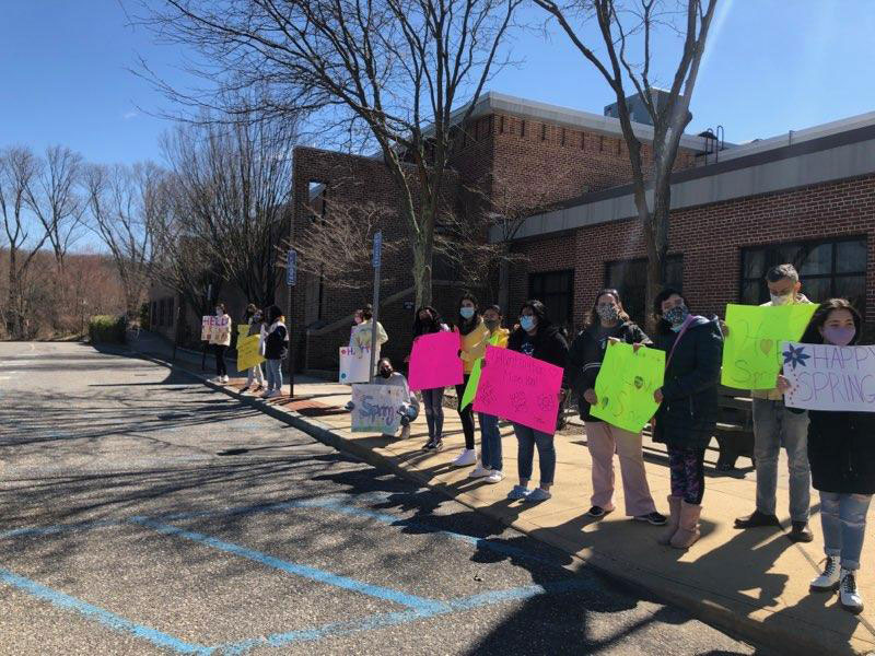 Huntington High School Grandfriends Club members rallied for the town's senior citizens.