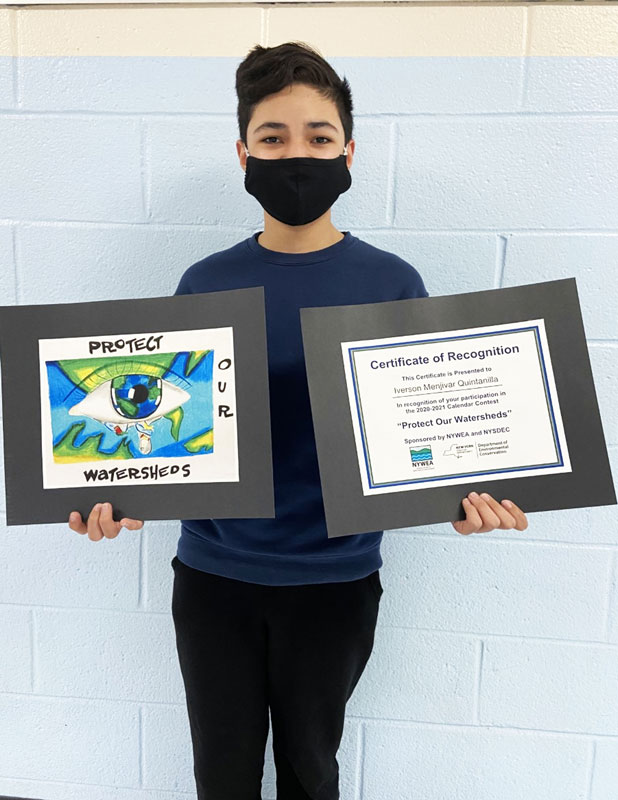 Finley's Iverson Menjivar Quintanilla with his award winning poster and certificate.