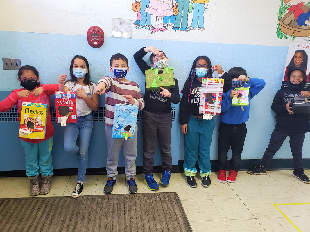 The second graders were very proud of the birdhouses they created 