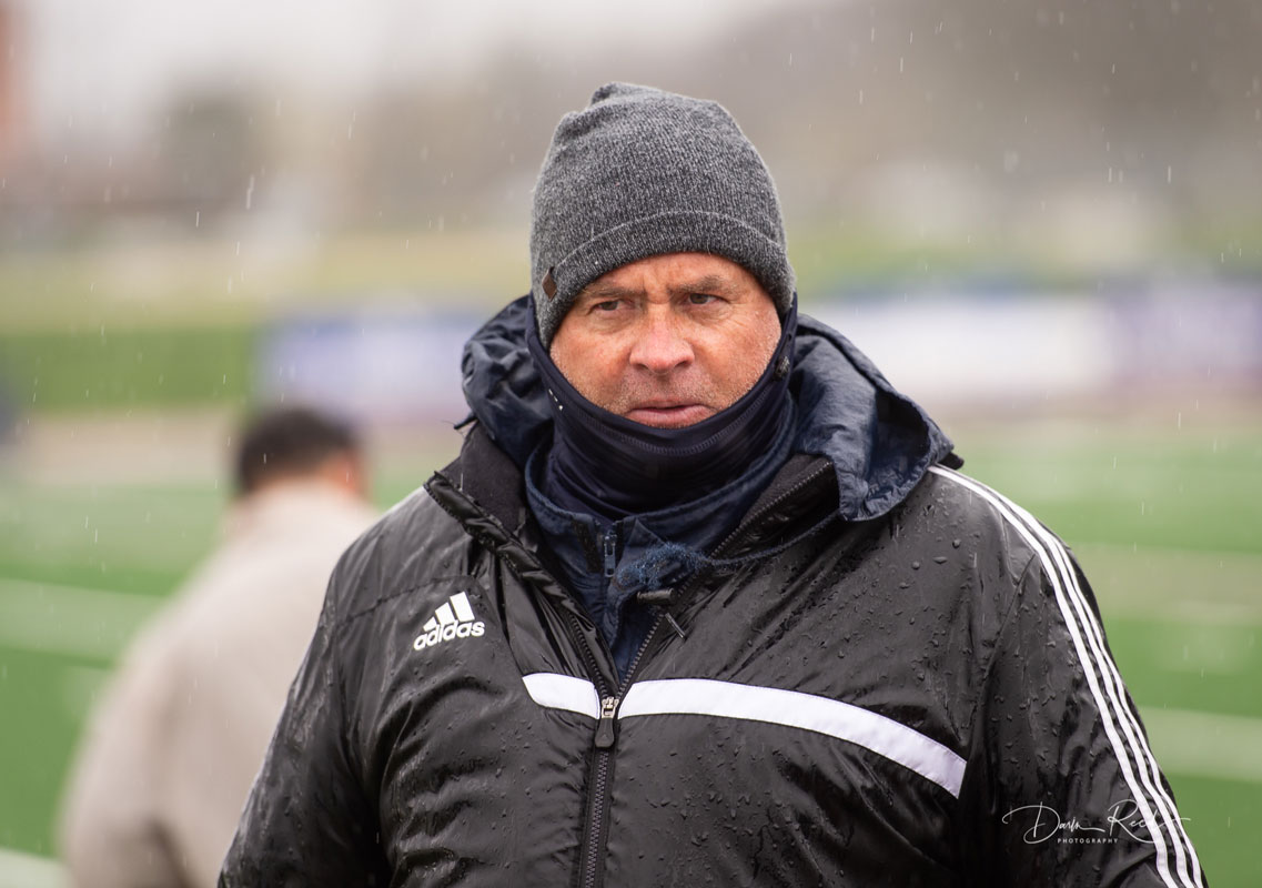 Huntington head coach John Pagano was bundled up for the game. (Darin Reed photo.)