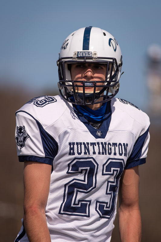 Huntington junior John Chirico lines up for the snap. (Darin Reed photo.)