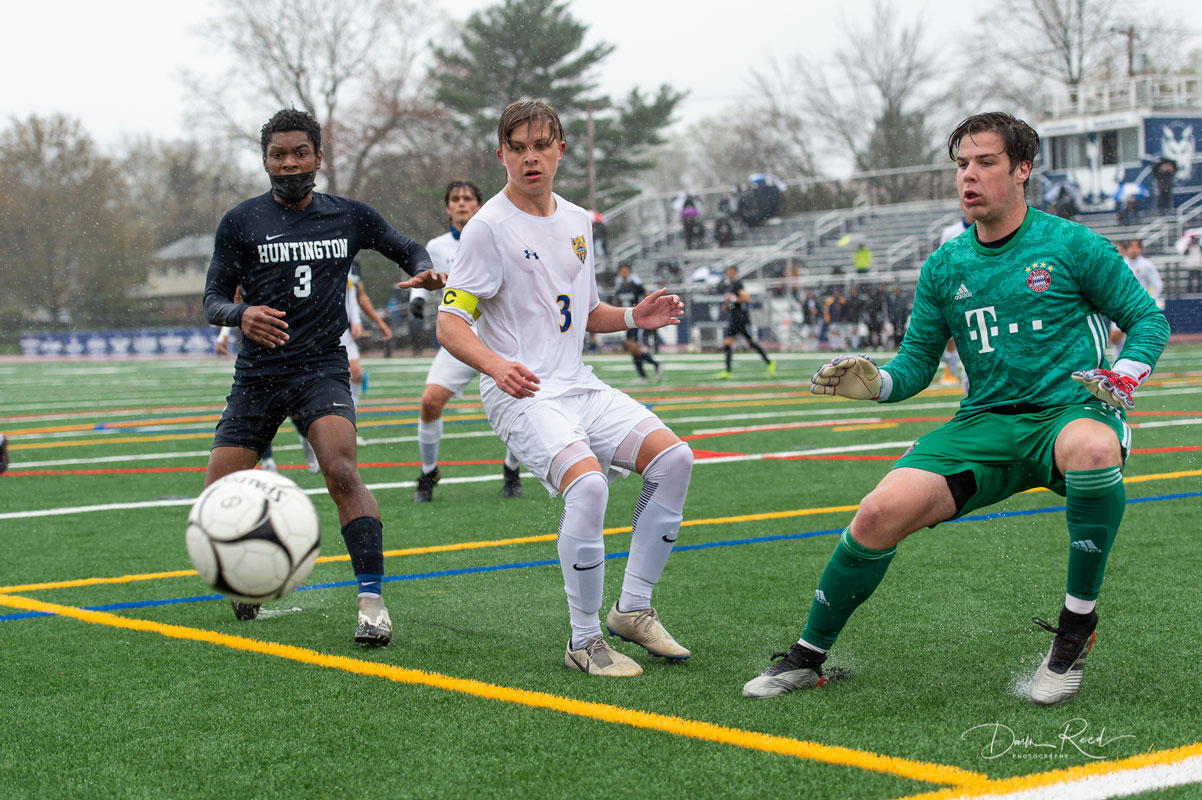 Play was fierce between the playoff opponents. (Darin Reed photo.)