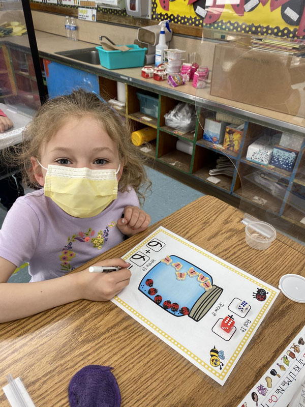 Washington School kindergartners have fun working on math challenges 