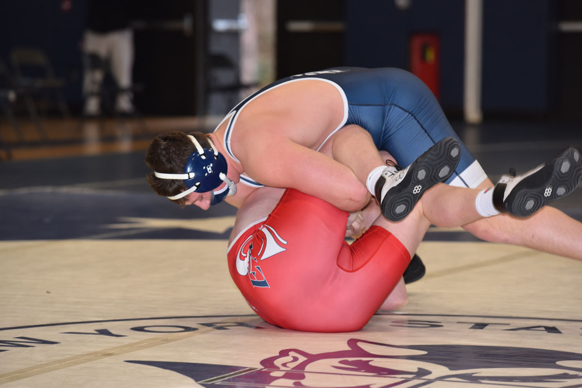 Robbie Smith (top) closes in on another pin.