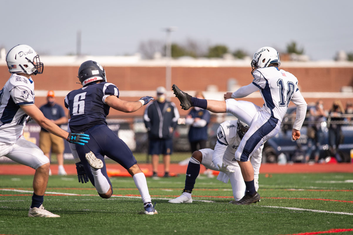 Senior placekicker Aidan Bender in action. (Darin Reed photo.)