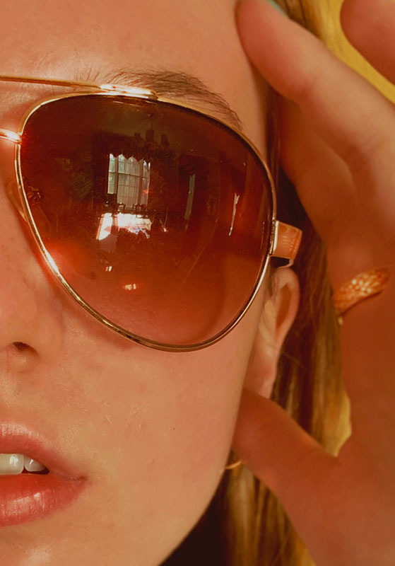 Anna Bell Young earned third place in the Windows & Doors category for the sunglass reflection photo.