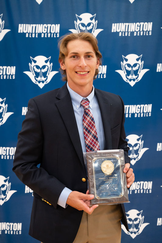 Jack Krisch displays this year's Donald A. Loughlin Founders Award.
