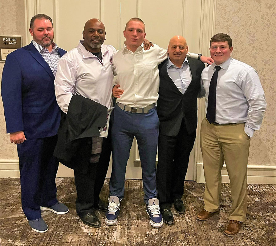 Huntington football coaches and All County players Liam McDonald and Robbie Smith.