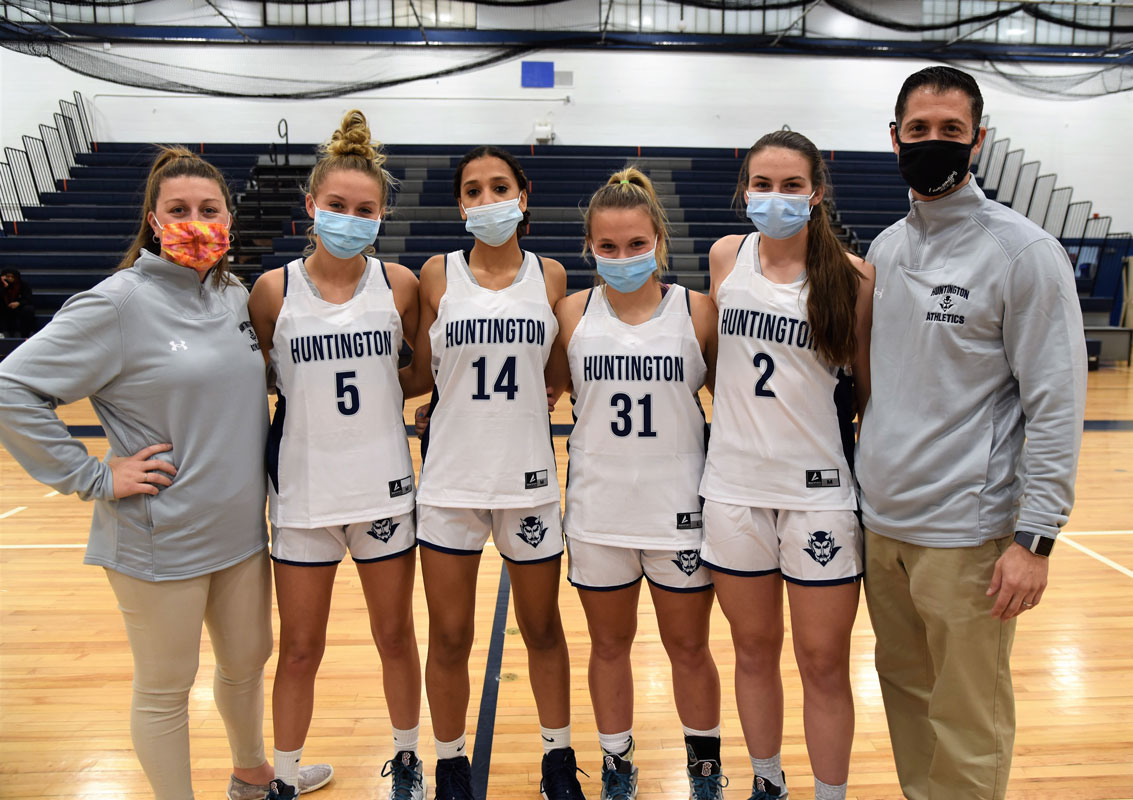The Blue Devil captains and coaches.  