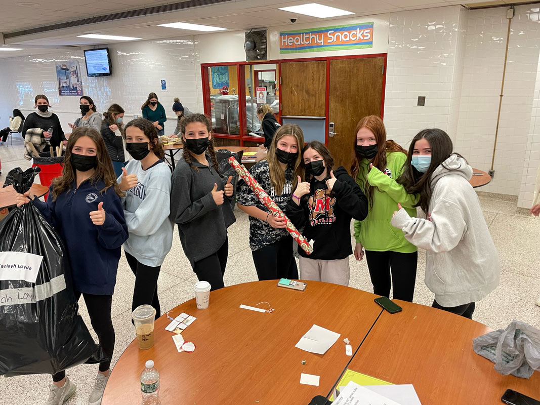 Key Club members gathered at Hills West to wrap the gifts.